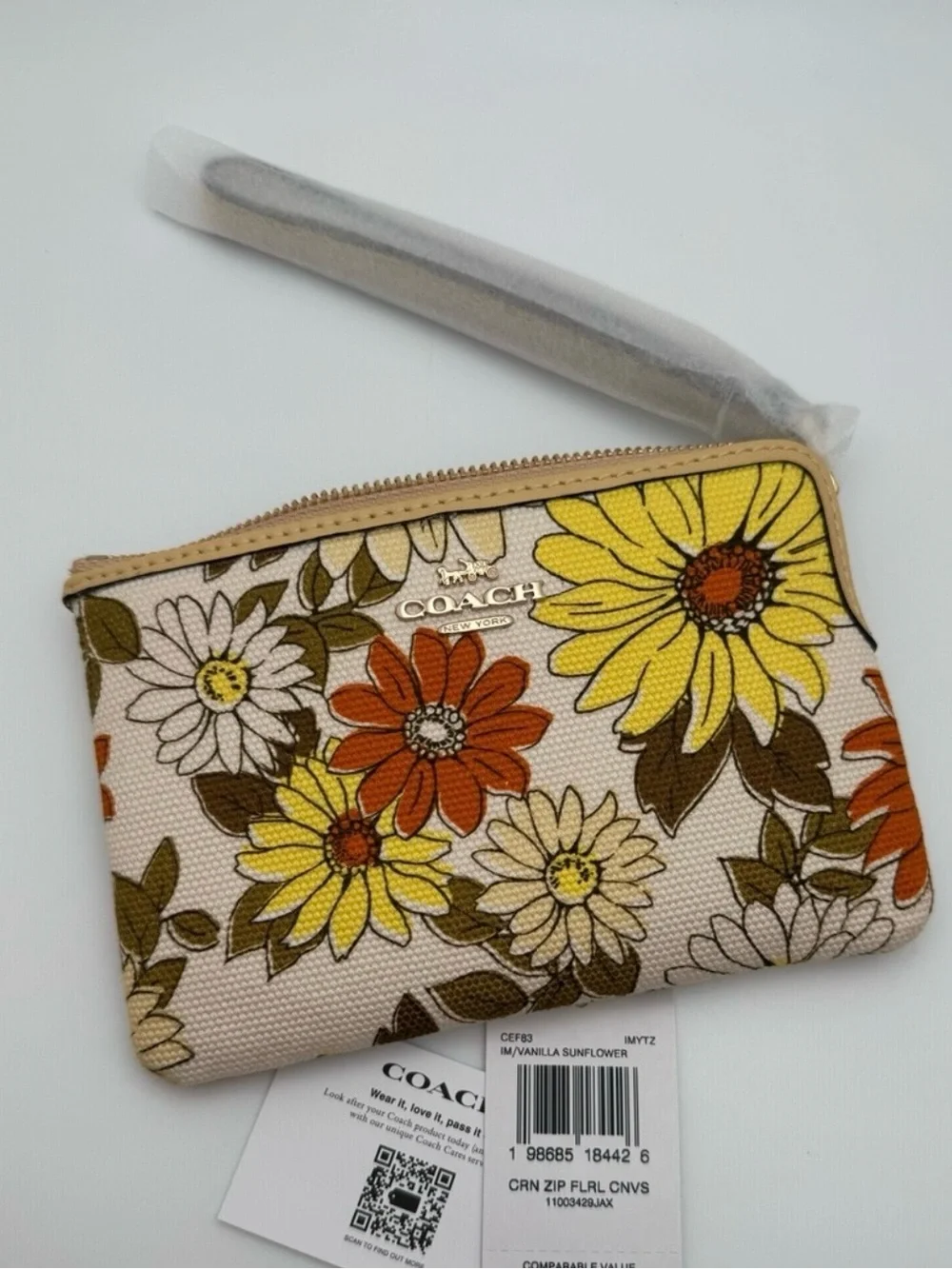 Coach CEF83 Vanilla Sunflower Floral Corner Zip Wristlet Canvas Leather Bag NWT
